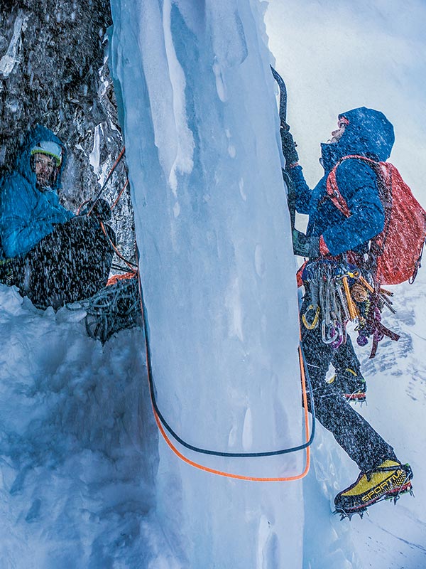 ice climber and belayer wearing Patagonia clothing